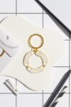 2024+10+brunhilda+illustration+soft+enamel+gold+color+keyring+create+white+background+Large